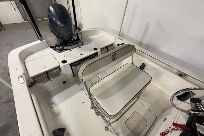 Slide: The Image of 2020 Carolina Skiff 21 LS boat interior with seating and motor. - 10