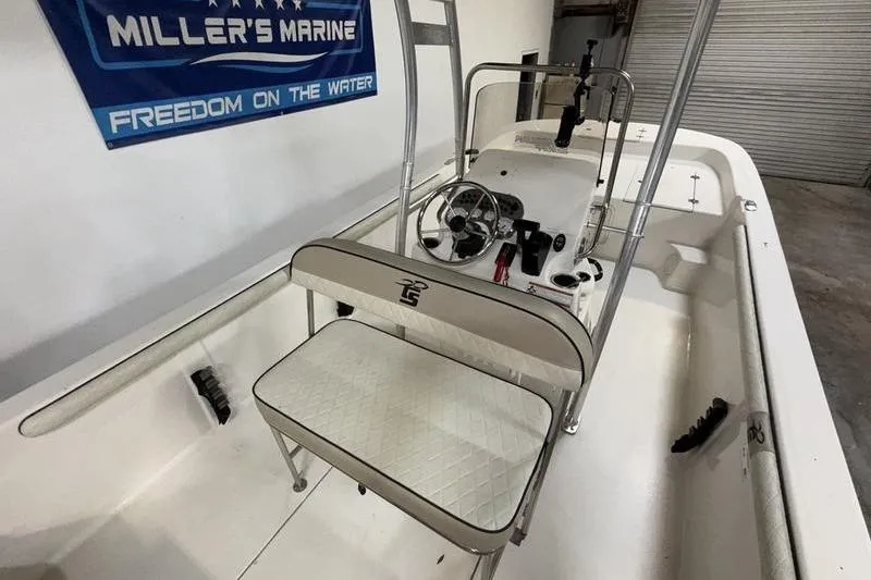 Slide: The Image of 2020 Carolina Skiff 21 LS boat interior with steering console and seating. - 12
