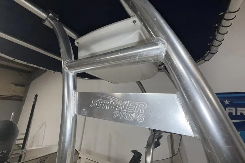 Slide: The Image of 2020 Carolina Skiff 21 LS with Stryker T-Tops, showcasing sturdy aluminum frame. - 14