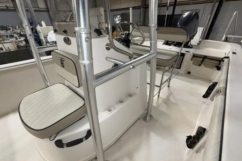 Slide: The Image of 2020 Carolina Skiff 21 LS boat interior with steering console and seating. - 15