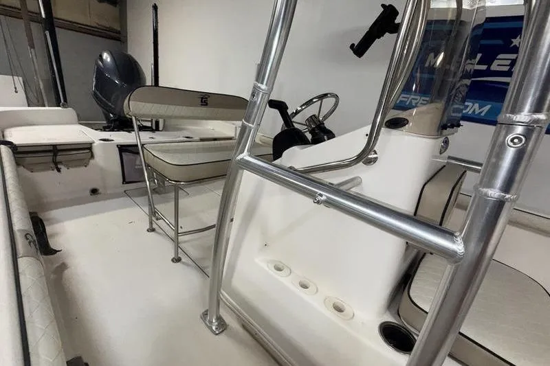 Slide: The Image of 2020 Carolina Skiff 21 LS boat interior with seating and steering console. - 17