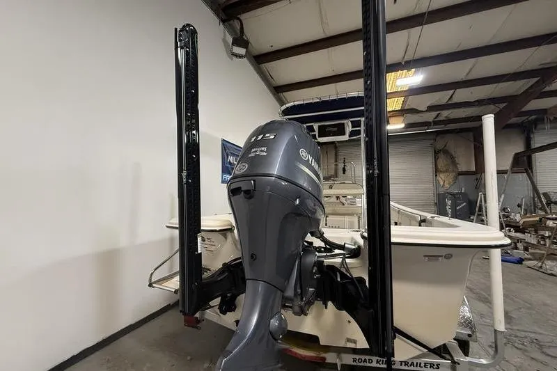Slide: The Image of 2020 Carolina Skiff 21 LS boat with Yamaha outboard motor in a warehouse. - 6