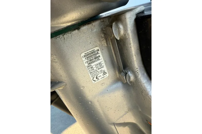 Slide: The Image of Boston Whaler 240 Vantage 2022 engine label with model and specifications. - 8