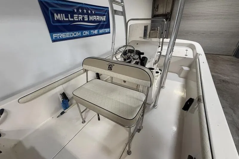 Slide: The Image of 2020 Carolina Skiff 21 LS boat interior with seating and steering console. - 11