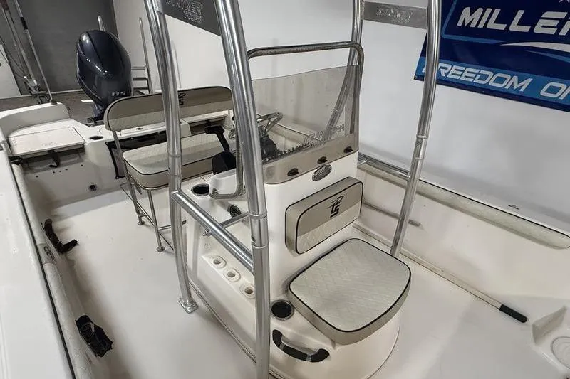 Slide: The Image of 2020 Carolina Skiff 21 LS boat interior with seating and console. - 12