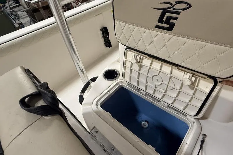 Slide: The Image of 2020 Carolina Skiff 21 LS boat interior with open storage compartment. - 15