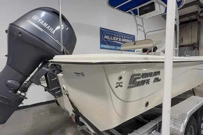 Slide: The Image of 2020 Carolina Skiff 21 LS boat with Yamaha outboard motor in showroom. - 5