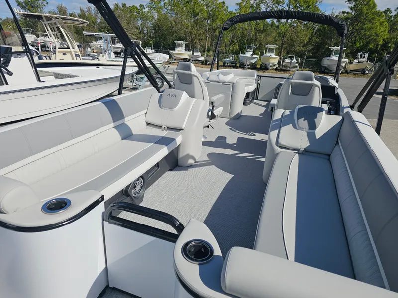 Slide: The Image of Luxurious interior of Avalon Catalina 2585 Quad Lounger pontoon, model year 2026. - 13