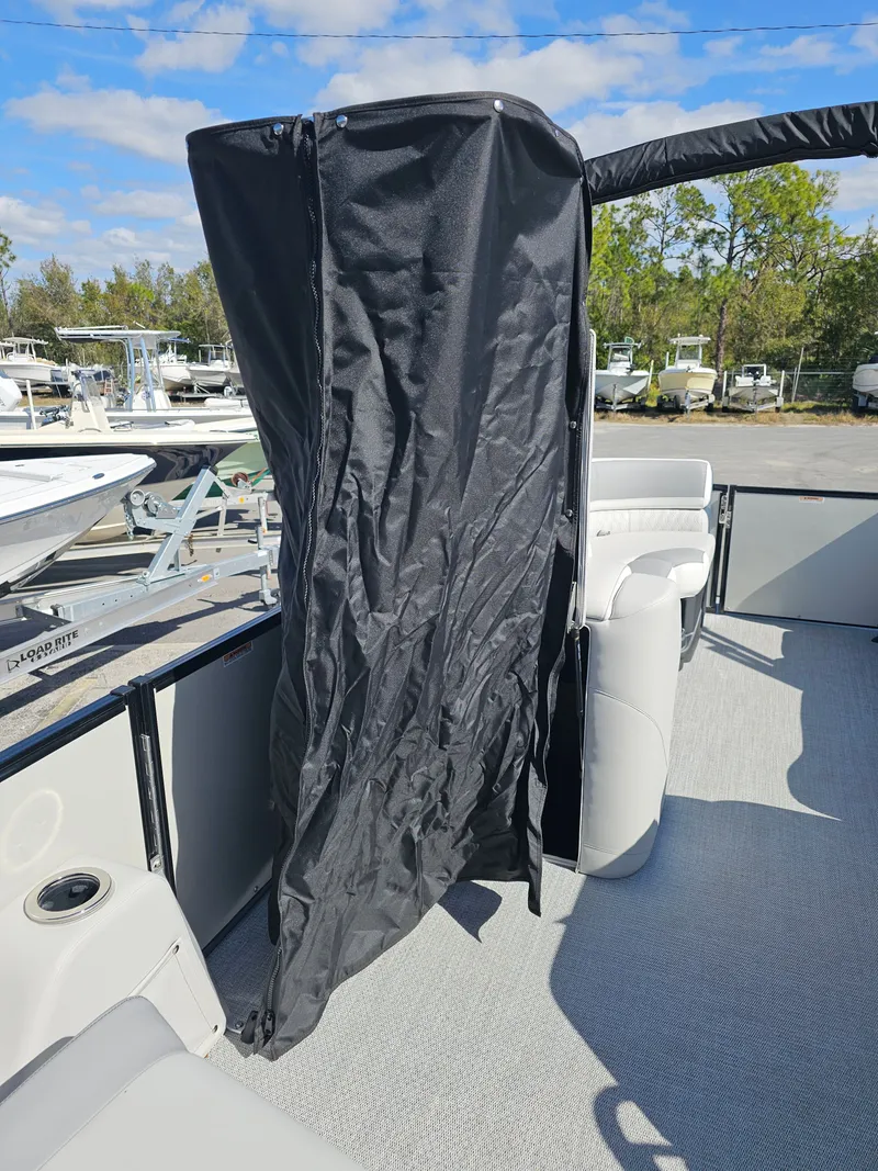 Slide: The Image of 2026 Avalon Catalina 2585 Pontoon with black privacy curtain. - 16