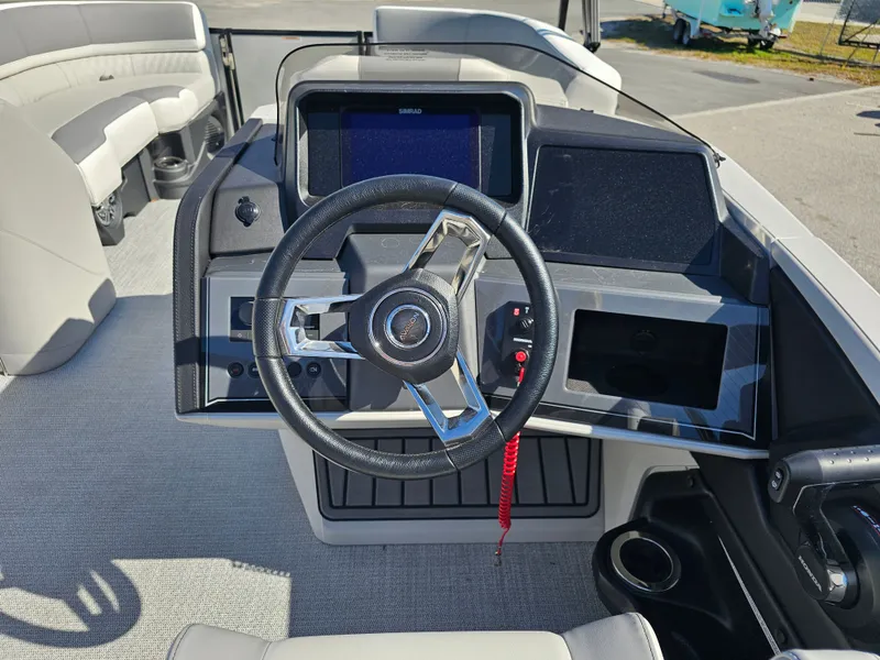 Slide: The Image of Steering console of Avalon Catalina 2585 Quad Lounger 2026. - 25
