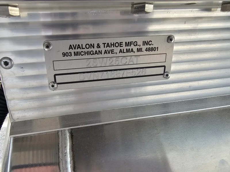 Slide: The Image of Metal plate on Avalon Luxury Pontoon, model CATALINA 2585 QUAD LOUNGER, year 2026. - 49