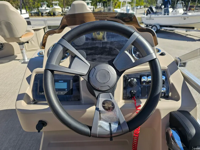Slide: The Image of Steering wheel of Avalon Luxury Pontoons VENTURE 85, 2026 model. - 10