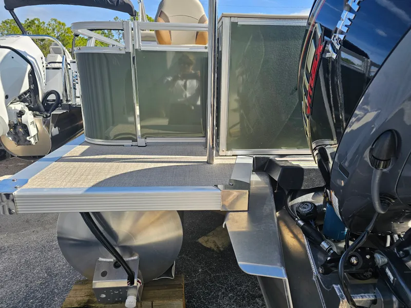 Slide: The Image of 2026 Avalon Venture 85 Tritoon with Yamaha engine, luxury design. - 2