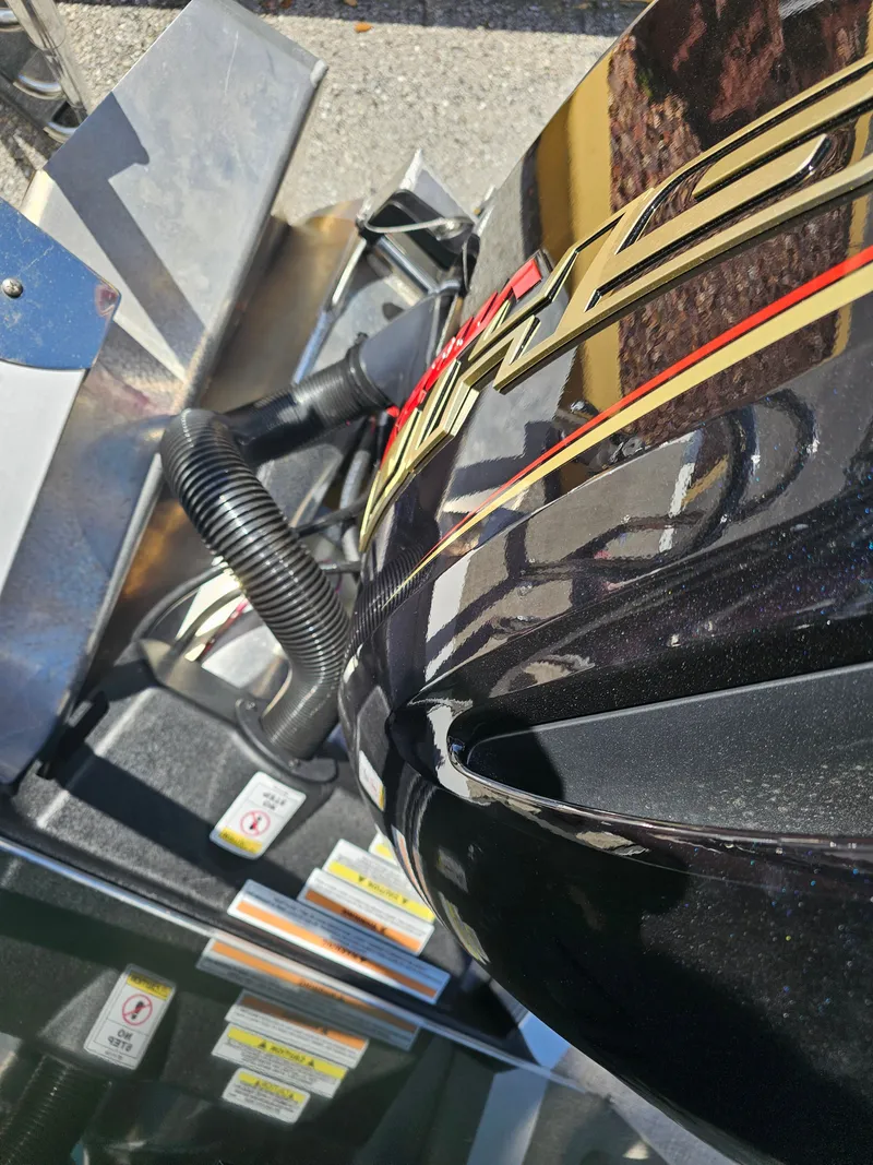 Slide: The Image of Close-up of 2026 Avalon Venture 85 Rear Fish Tritoon engine. - 21