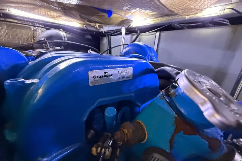 Slide: The Image of Engine compartment of a 1998 Silverton 40 Convertible with Crusader engine. - 92