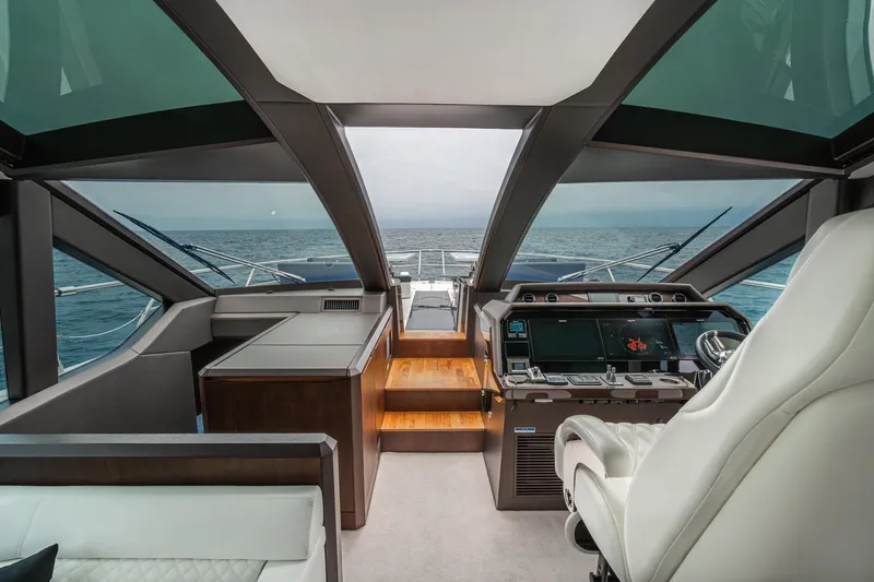 Slide: The Image of Luxurious 2023 Galeon 640 Fly yacht interior with modern helm and ocean view. - 22