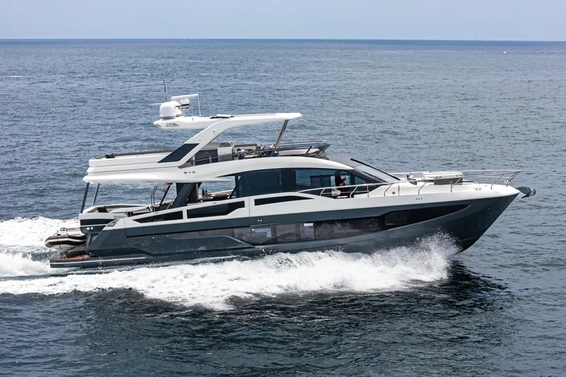 Slide: The Image of 2023 Galeon 640 Fly yacht cruising on open sea. - 3