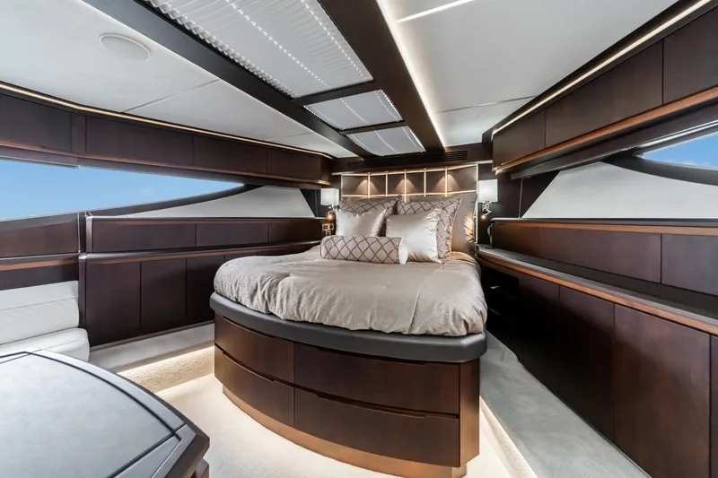Slide: The Image of Luxurious bedroom interior of 2023 Galeon 640 Fly yacht with elegant wood finishes. - 35