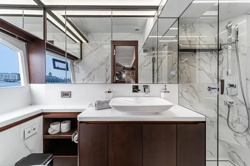 Slide: The Image of Luxurious bathroom on 2023 Galeon 640 Fly yacht with marble accents and modern fixtures. - 38