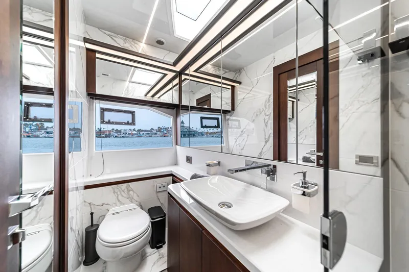 Slide: The Image of Luxurious bathroom interior of 2023 Galeon 640 Fly yacht with marble accents and modern fixtures. - 44