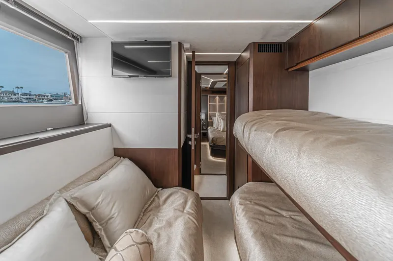 Slide: The Image of Luxurious interior of 2023 Galeon 640 Fly yacht with cozy bunk beds and modern decor. - 45