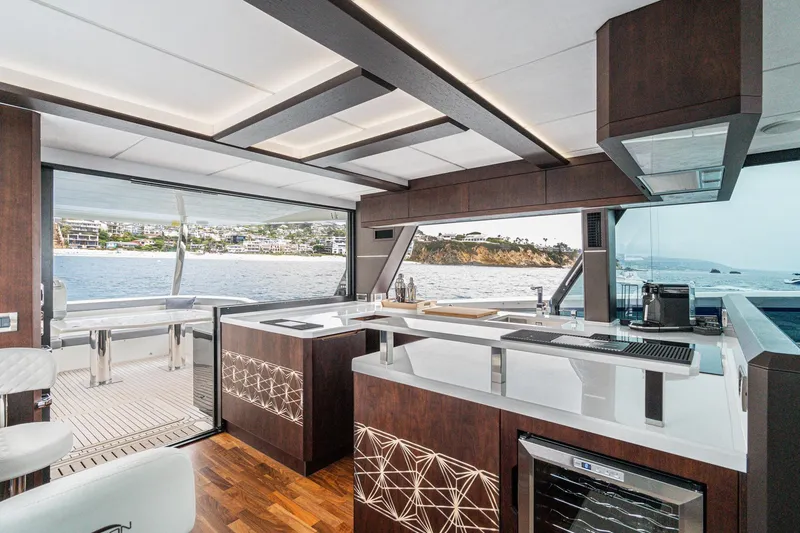 Slide: The Image of Luxurious interior of 2023 Galeon 640 Fly yacht with modern kitchen and ocean view. - 47