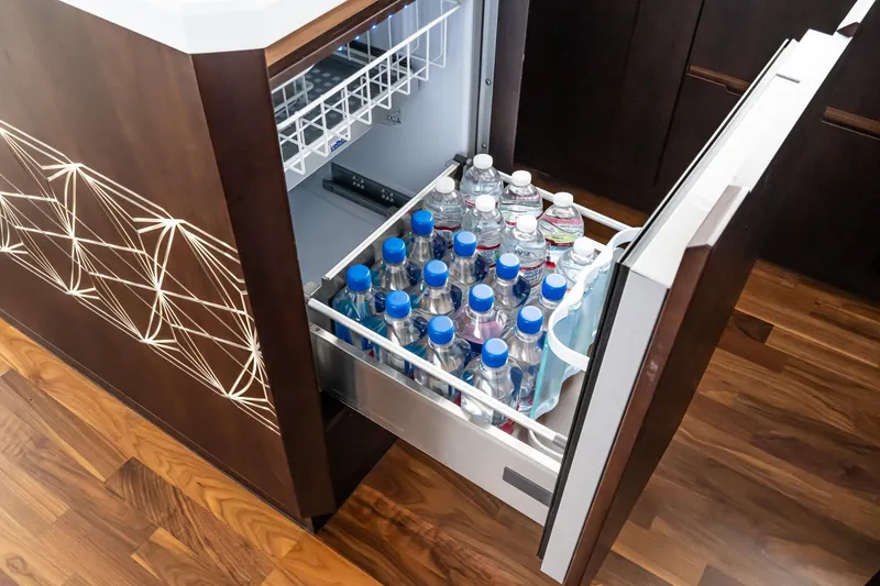 Slide: The Image of Open drawer fridge with bottled drinks on Galeon 640 Fly yacht, 2023 model. - 48