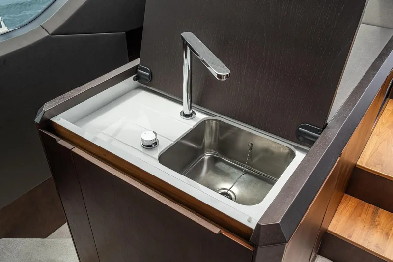 Slide: The Image of Luxury sink area on 2023 Galeon 640 Fly yacht, featuring modern design and sleek faucet. - 60