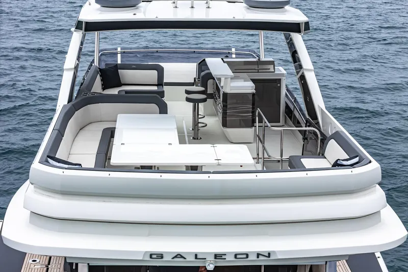 Slide: The Image of 2023 Galeon 640 Fly yacht with spacious flybridge and modern seating area. - 66