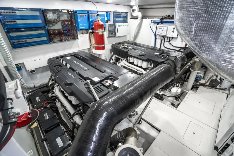 Slide: The Image of Engine room of 2023 Galeon 640 Fly yacht with Volvo Penta engines and safety equipment. - 69