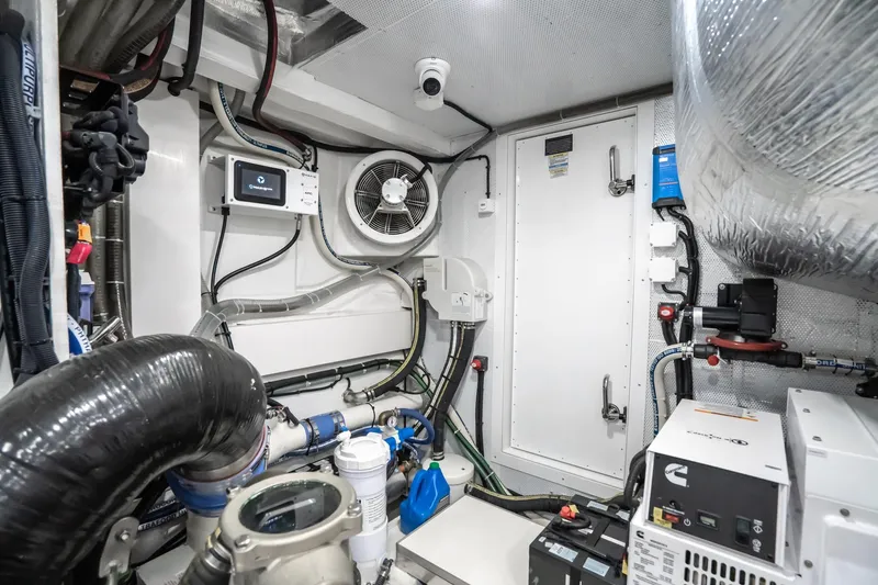 Slide: The Image of Engine room of 2023 Galeon 640 Fly yacht with modern equipment and wiring. - 75