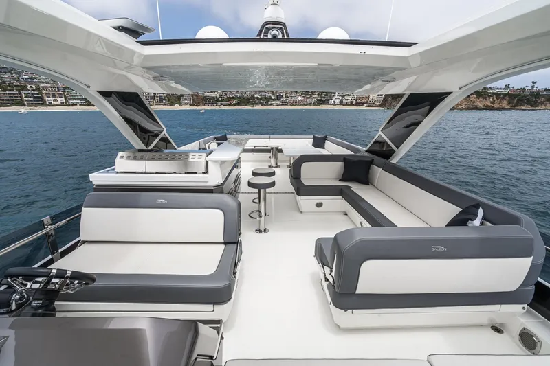 Slide: The Image of Luxurious 2023 Galeon 640 Fly yacht with spacious seating and ocean view. - 9