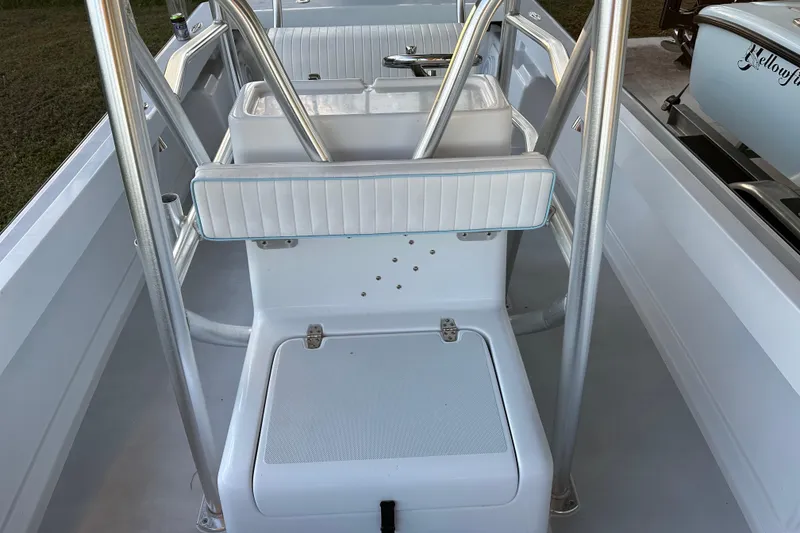 Slide: The Image of 1974 Aquasport 2400 Center Console interior with seating and metal framework. - 14