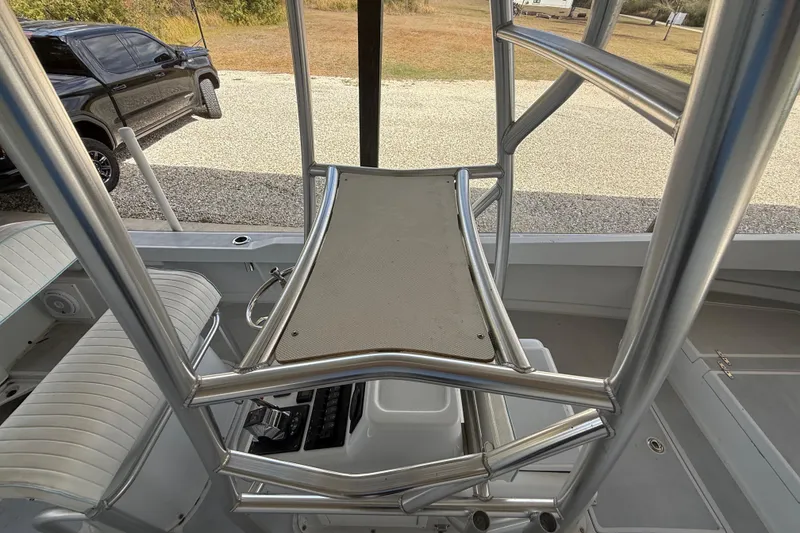 Slide: The Image of 1974 Aquasport 2400 Center Console interior with seating and console view. - 35