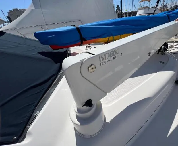 Slide: The Image of 1997 Bayliner 3788 Command Bridge Motoryacht with WD600 Steelhead Marine crane on deck. - 12