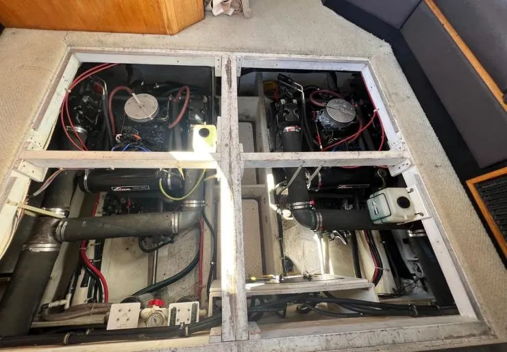 Slide: The Image of Engine compartment of 1997 Bayliner 3788 Command Bridge Motoryacht, showing dual engines and wiring. - 31