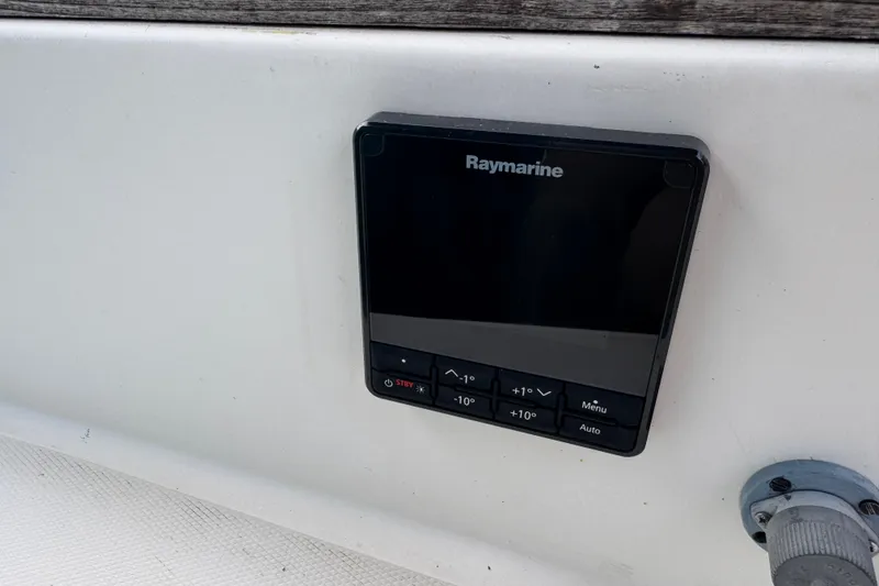 Slide: The Image of Raymarine control panel on 1983 Sabre 34 sailboat, mounted on white surface. - 18