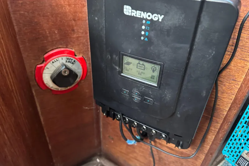 Slide: The Image of Renogy solar charge controller in 1983 Sabre 34 sailboat interior. - 23