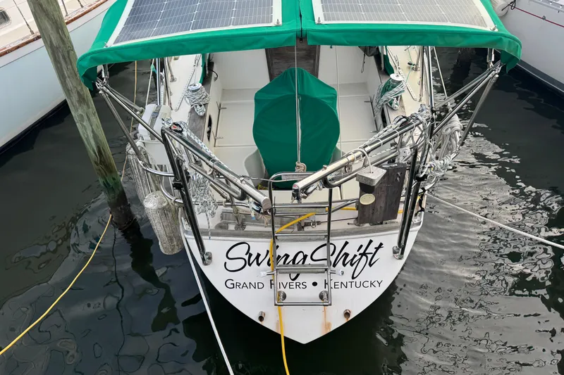 Slide: The Image of 1983 Sabre 34 sailboat with solar panels, docked in Grand Rivers, Kentucky. - 7