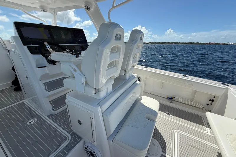 Slide: The Image of 2008 Hydra-Sports Vector 3500 VX boat interior with helm seats and ocean view. - 21