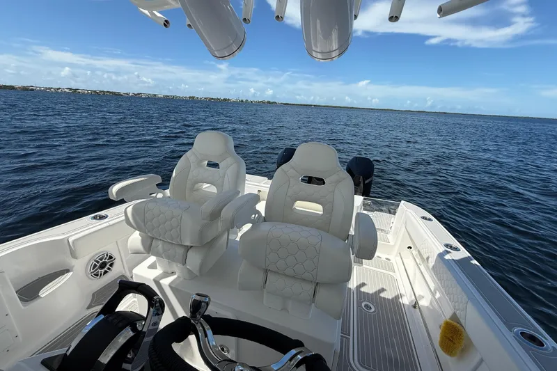 Slide: The Image of 2008 Hydra-Sports Vector 3500 VX boat interior with luxurious seating on open water. - 23