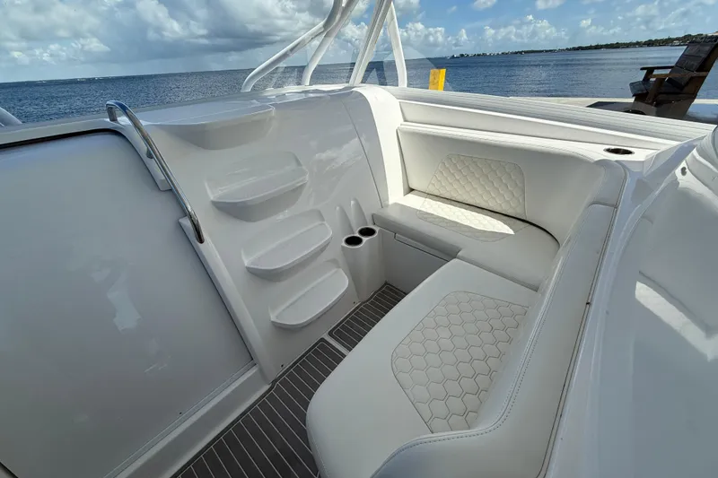 Slide: The Image of 2008 Hydra-Sports Vector 3500 VX boat interior with white seating and ocean view. - 28