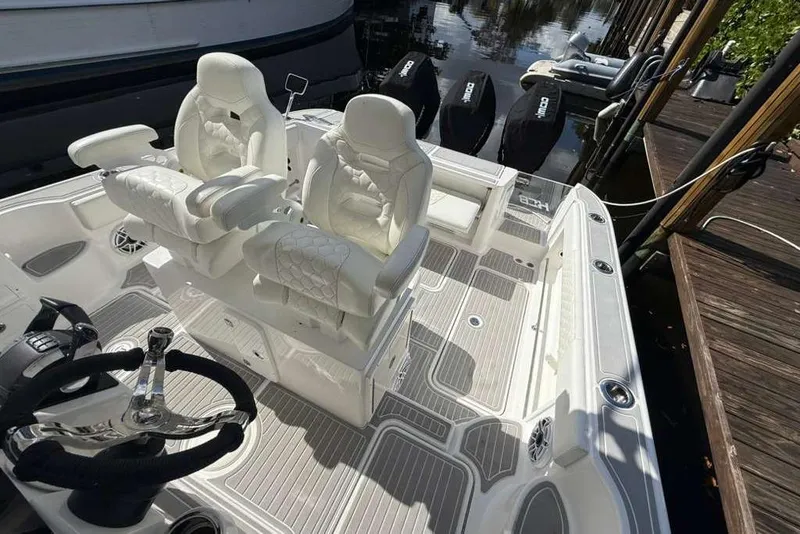 Slide: The Image of 2008 Hydra-Sports Vector 3500 VX boat interior with white seating and steering wheel. - 33