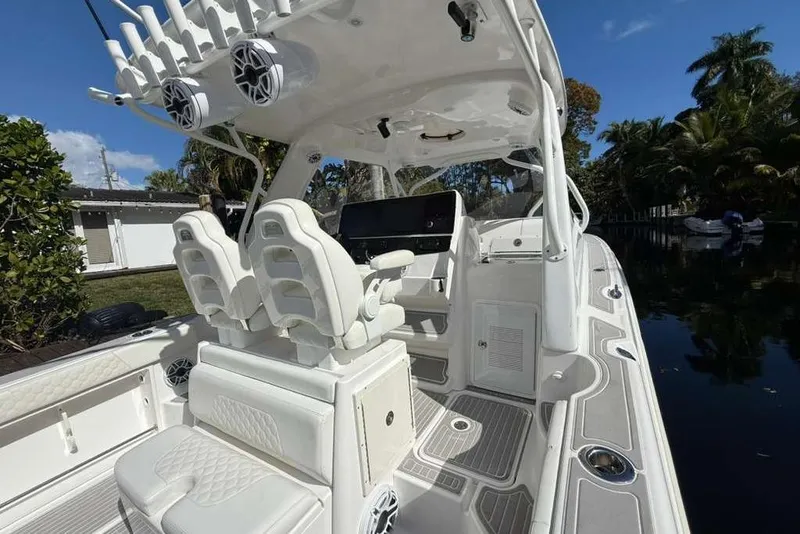 Slide: The Image of 2008 Hydra-Sports Vector 3500 VX boat interior with white seating and helm station. - 35