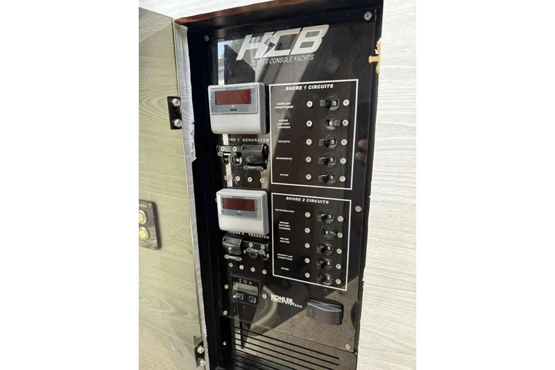 Slide: The Image of Electrical panel of 2008 Hydra-Sports Vector 3500 VX boat, featuring circuit controls. - 45