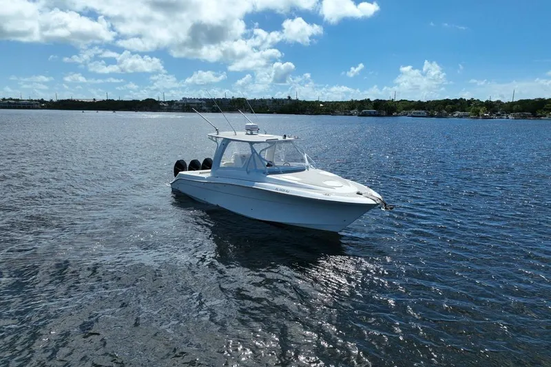 Slide: The Image of 2008 Hydra-Sports Vector 3500 VX boat on calm water under blue sky. - 9