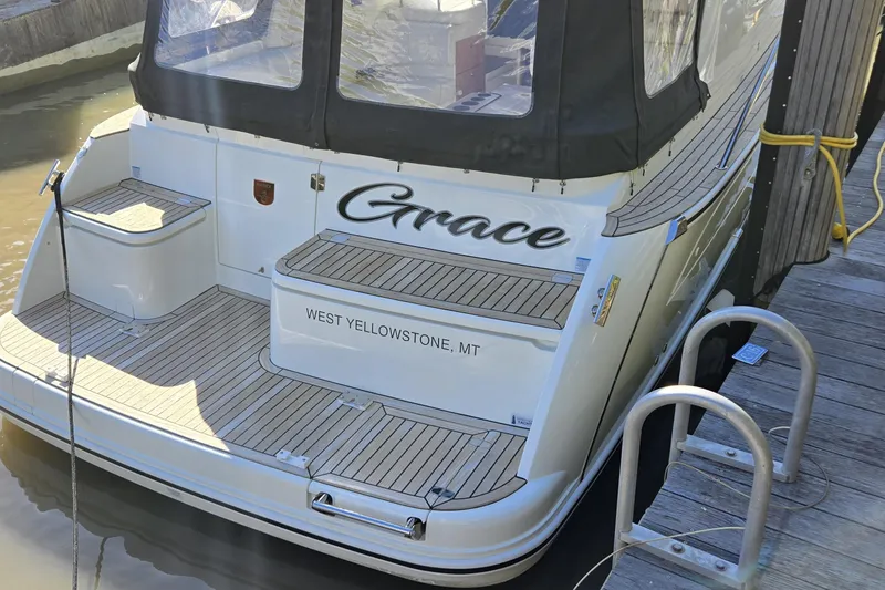 Slide: The Image of Marex 310 Sun Cruiser 2025 docked, featuring "Grace" and West Yellowstone, MT. - 1