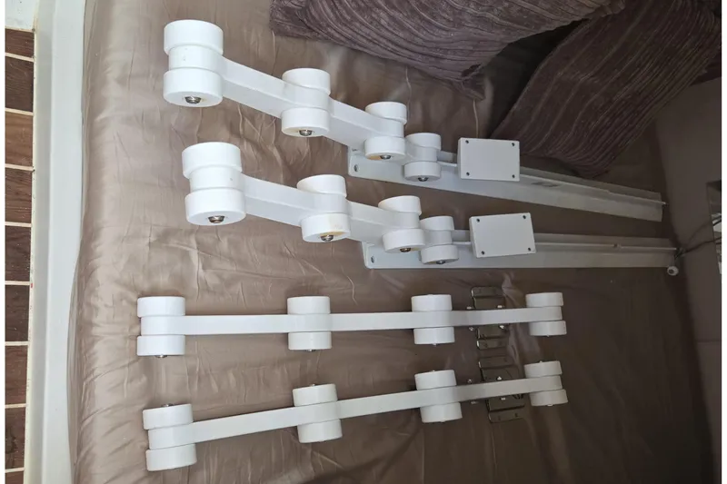 Slide: The Image of White boat accessories on a bed, Marex 310 Sun Cruiser 2025 model. - 12