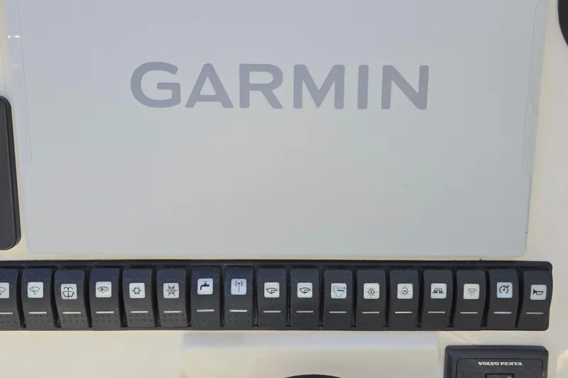 Slide: The Image of Control panel of 2025 Marex 310 Sun Cruiser with Garmin navigation system. - 13