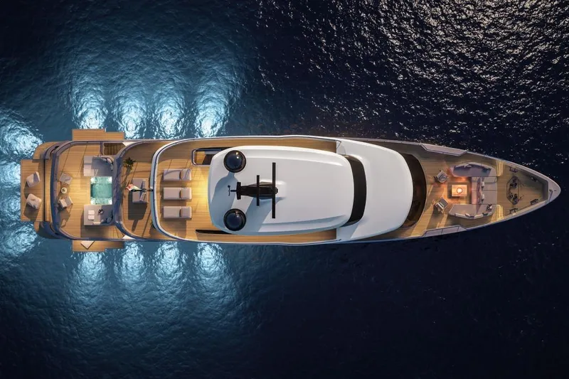 Slide: The Image of Top view of 2026 Azimut Grande 44M yacht with illuminated decks at night. - 23